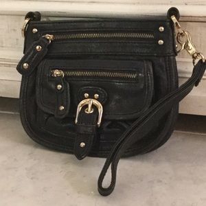 Leather handbag or wristlet by Jamar Drake